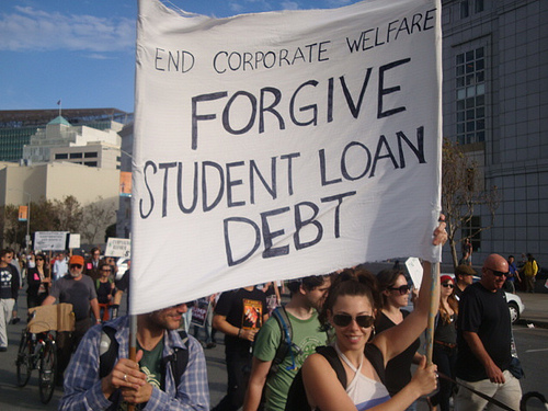 Promised college loan forgiveness, borrowers wait and wait - CBS News