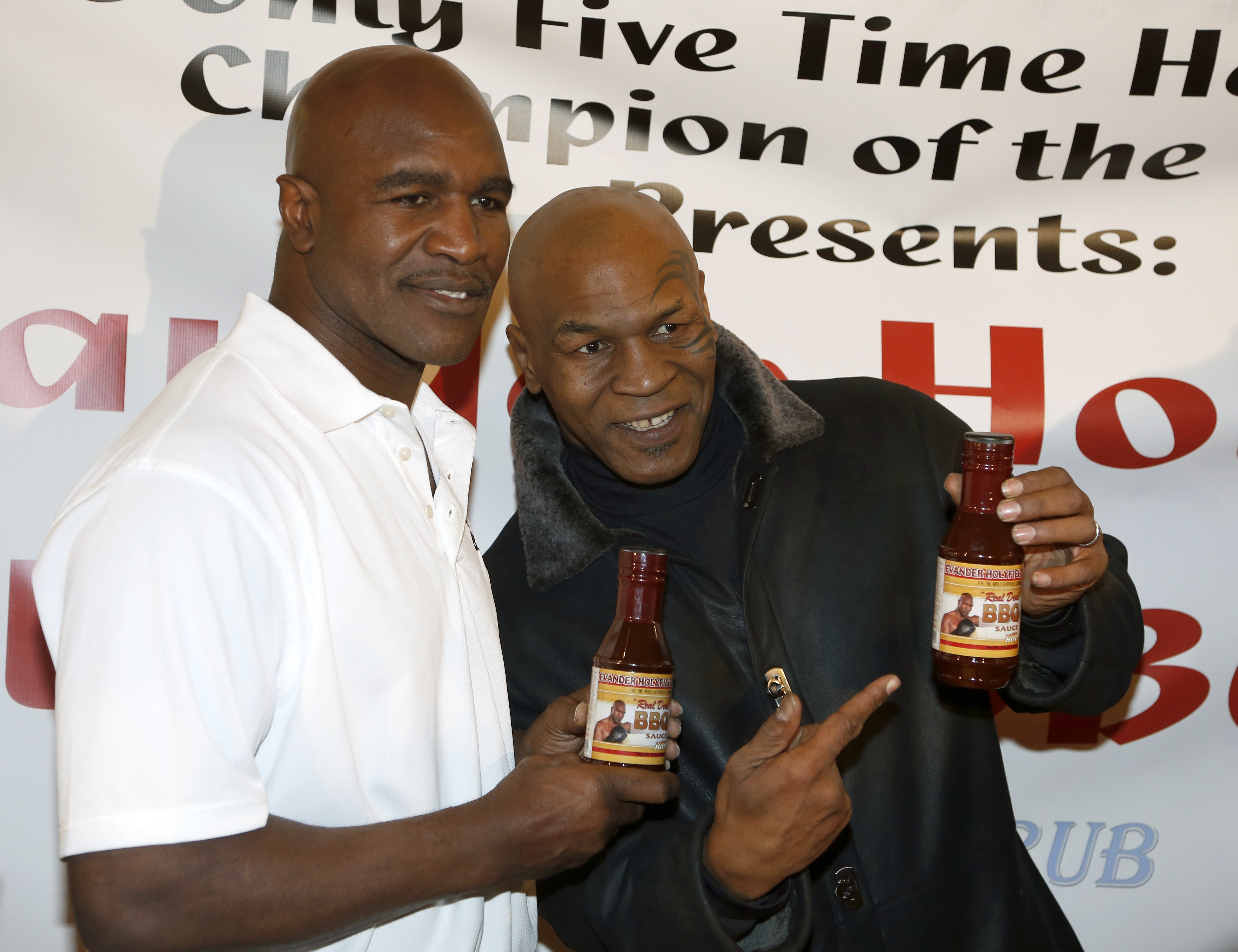 Mike Tyson, Evander Holyfield meet again - CBS News