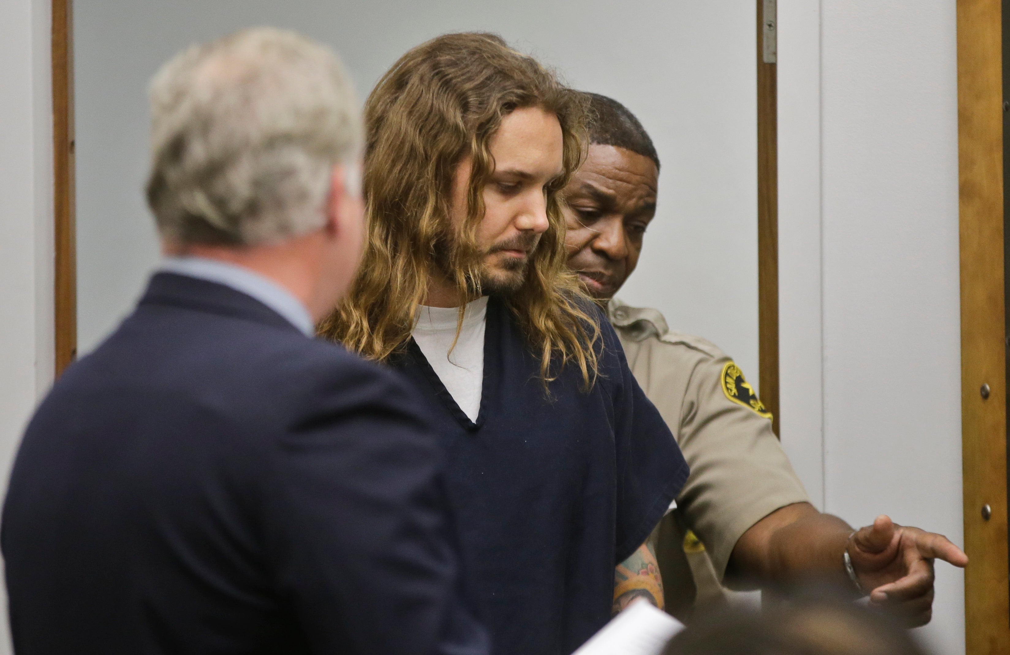 As I Lay Dying singer charged with soliciting wife's murder CBS News
