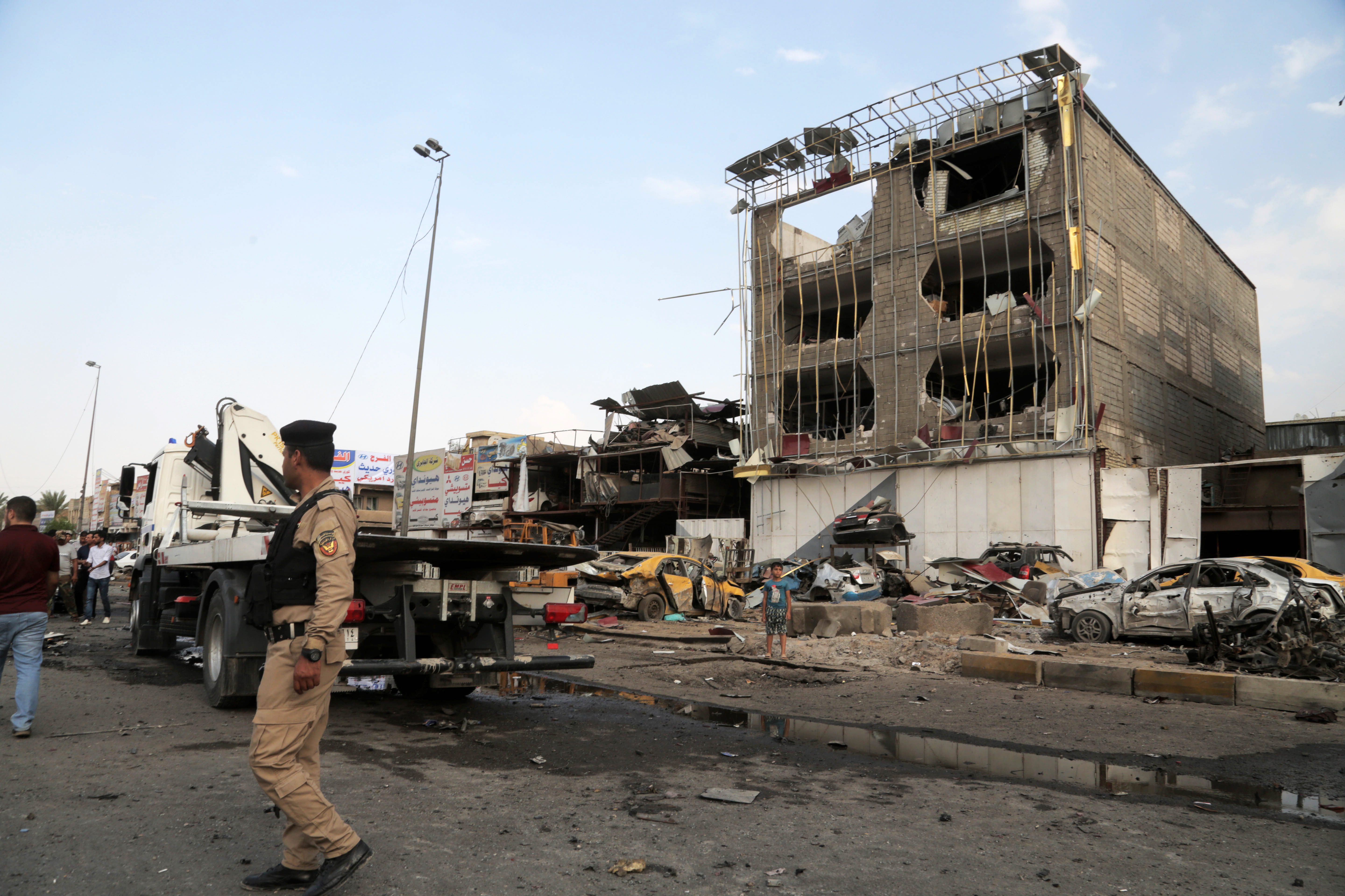 At least 50 killed in wave of Baghdad terror attacks CBS News