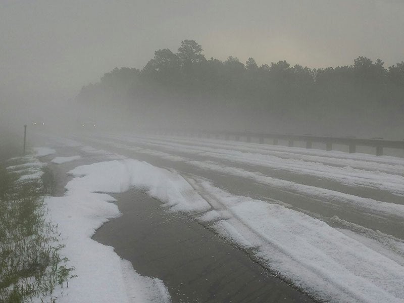 Summer hail prompts use of snowplows near Rapid City, South Dakota