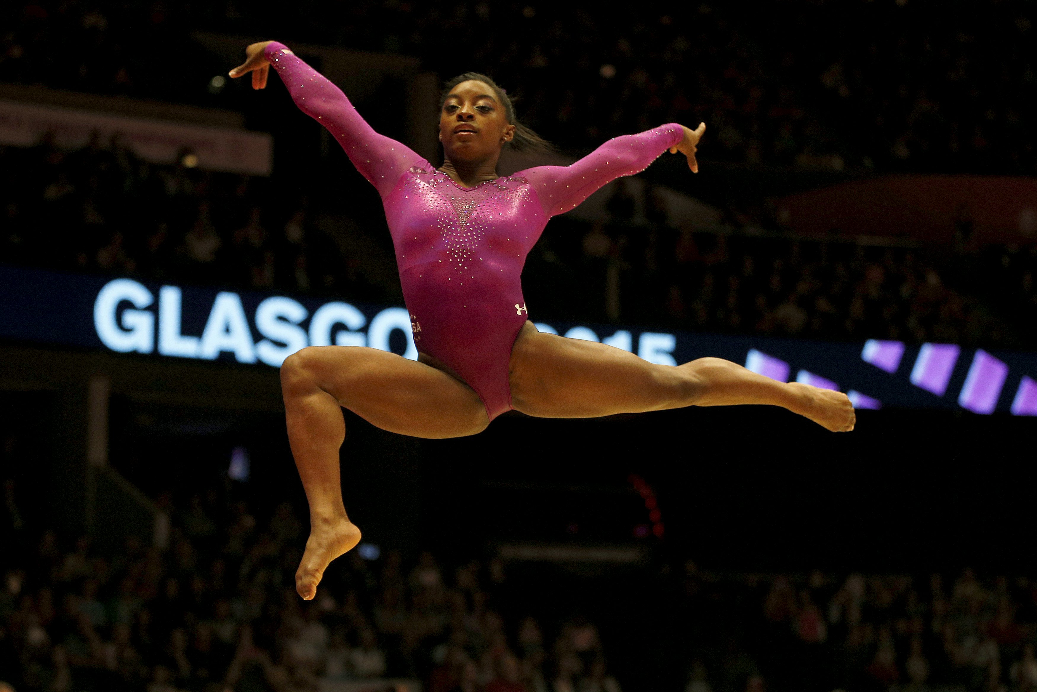 U S Gymnast Earns Record World Championship Gold Medals Cbs News