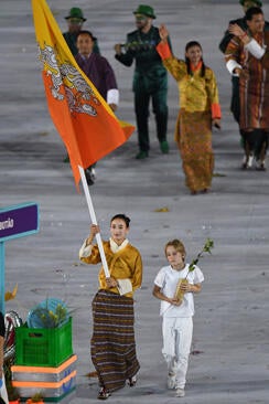 bhutan-flagbearer-karma-getty-586322134.jpg
