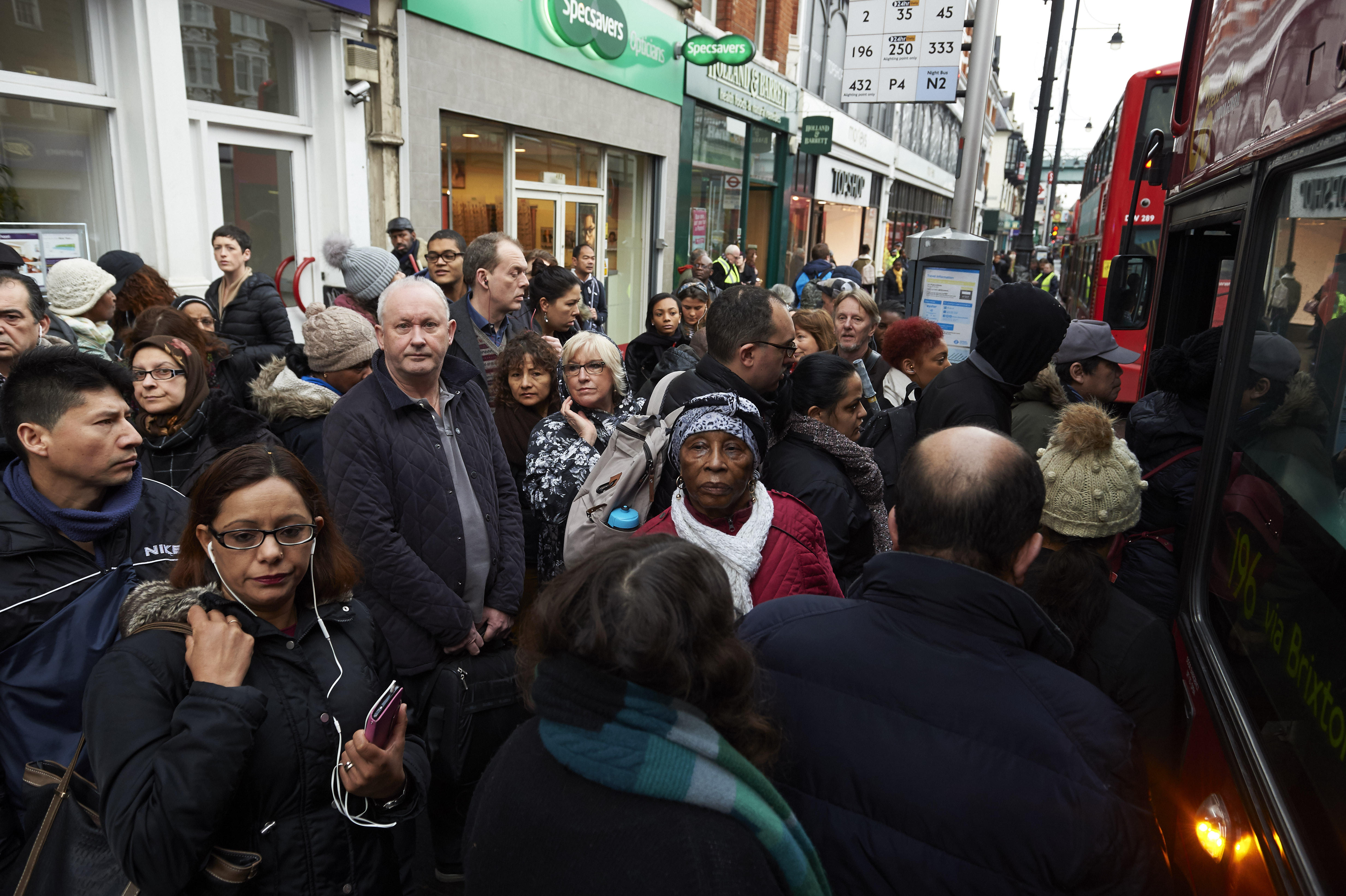 London Tube strike sees Underground subway halt and commuters cram onto