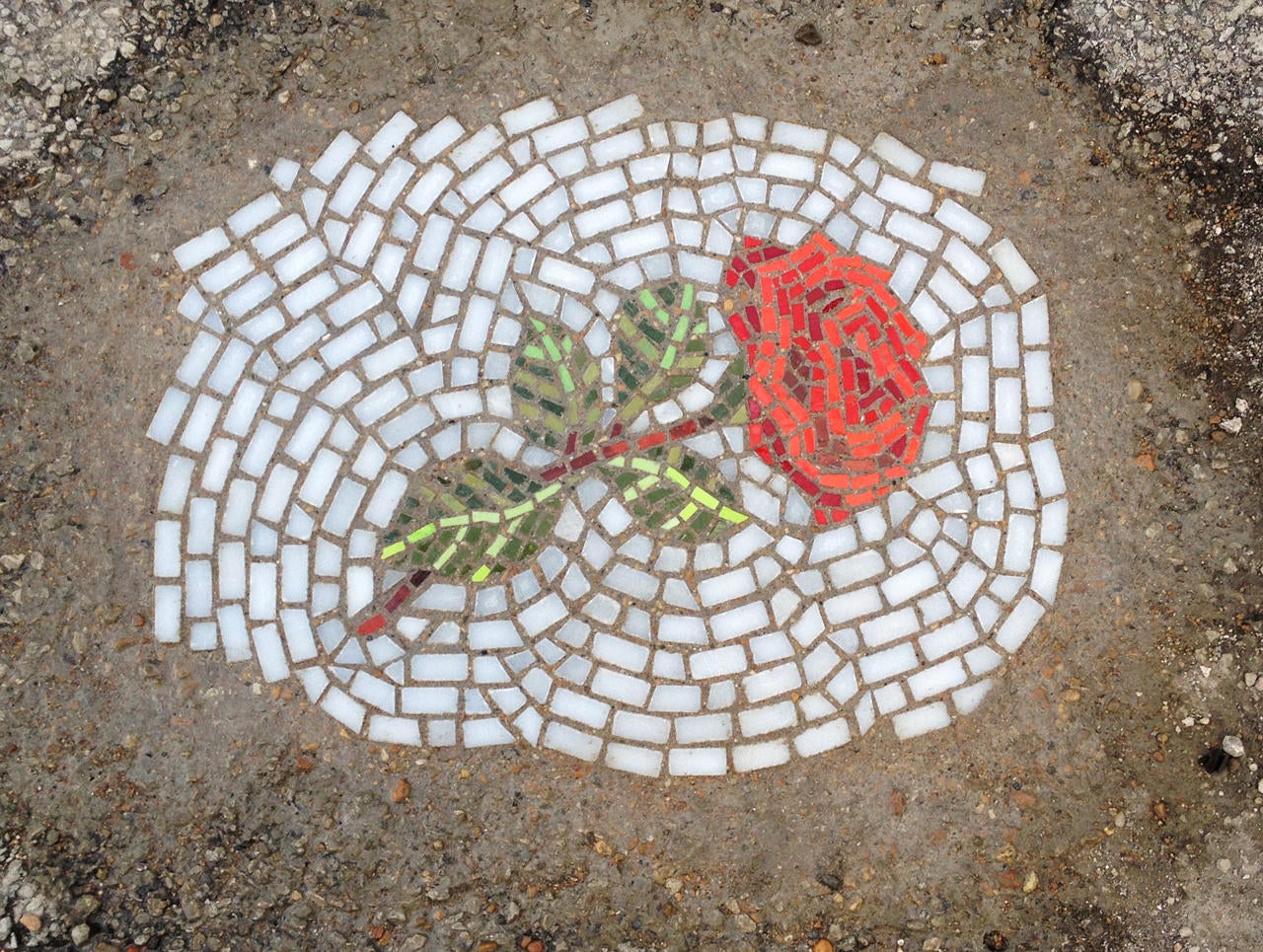 Pothole mosaics: Street art that fills a need - CBS News