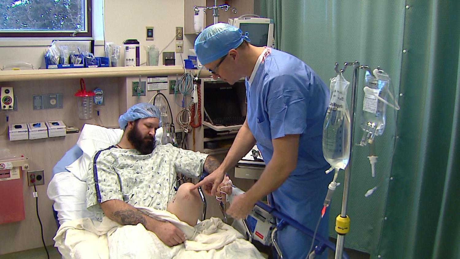 Wounded veteran, double amputee undergo groundbreaking surgery - CBS News