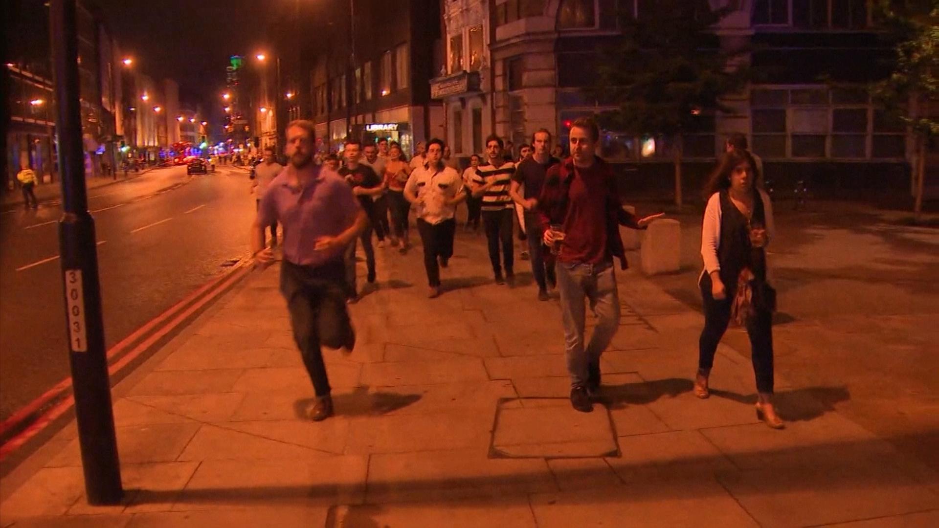 London terror attack Photo of man departing scene with beer in hand