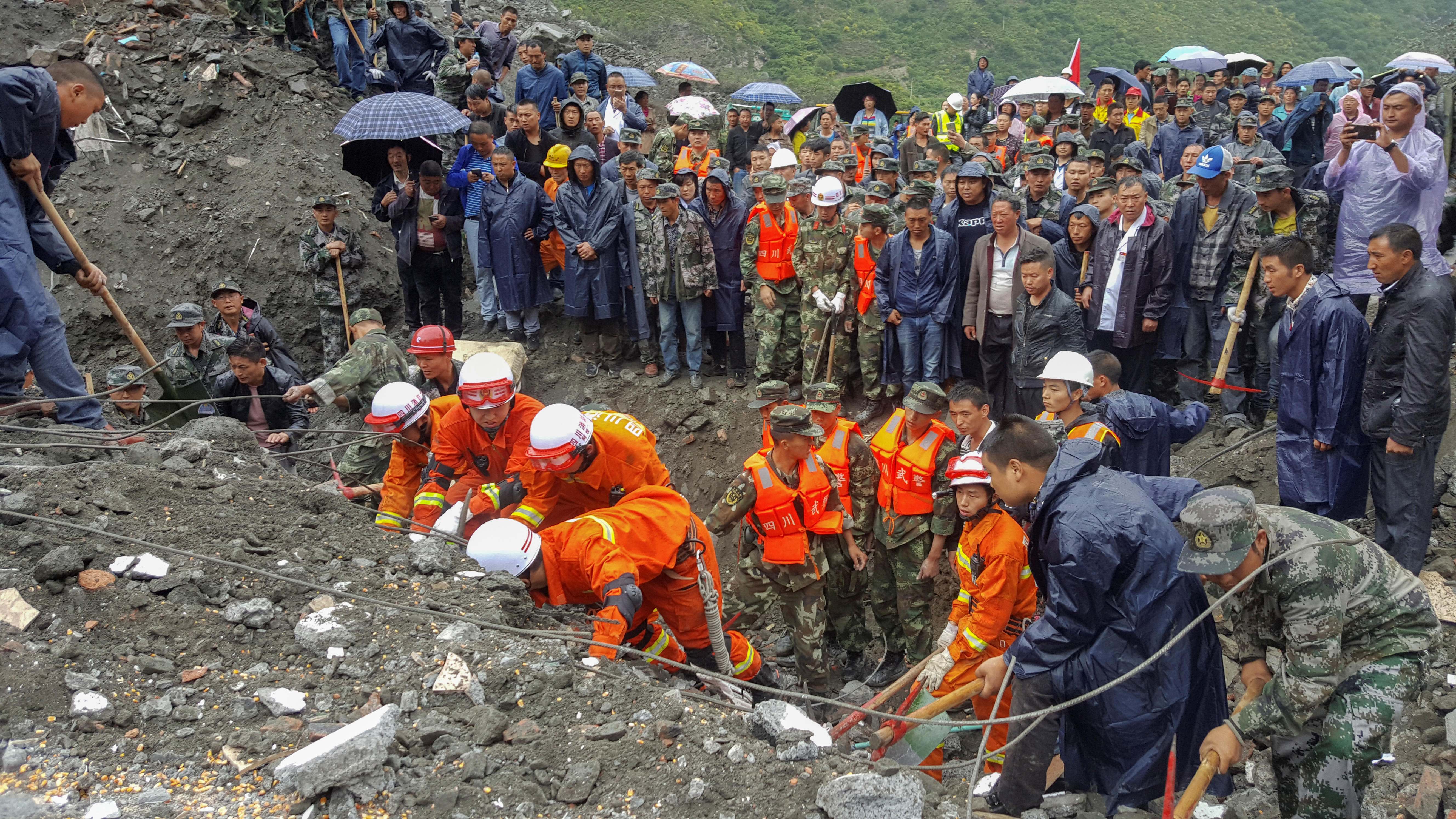 Massive landslide buries more than 120 people