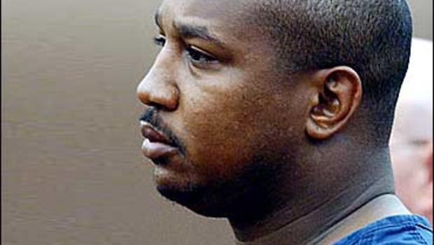 Derrick Todd Lee, 34, stands before Fulton County (Ga.) Superior Court Judge Richard Hicks in Atlanta, Wednesday, May 28, 2003 as he waived extradition to ... - image555860x