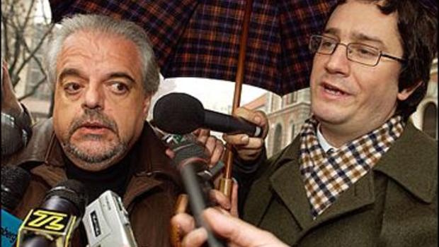 Lawyers for Parmalat founder and CEO Calisto Tanzi, Michele Ributti, left, and Fabio Belloni answer questions outside the Milan San Vittore prison, Italy, ... - image590897x