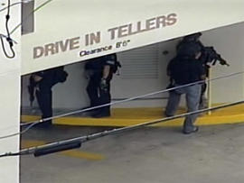 Fla. Bank Robbers Strap Bomb To Abducted Teller