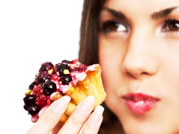 woman eats cake