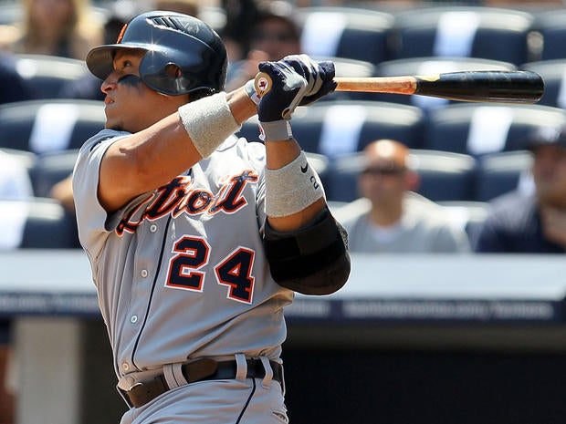 Miguel Cabrera follows through on a home run
