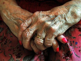 hands of an elderly resident at a nursing home