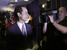 U.S. Congressman Anthony Weiner, D-NY, is pursued by the media as he leaves a news conference in New York, June 6, 2011.
