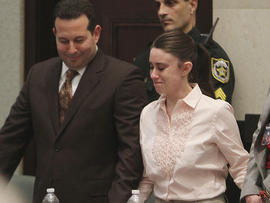 Defense attorney Jose Baez and Casey Anthony react after the jury acquitted her of murdering her daughter, Caylee, during Anthony's murder trial at the Orange County Courthouse in Orlando, Fla., July 5, 2011.