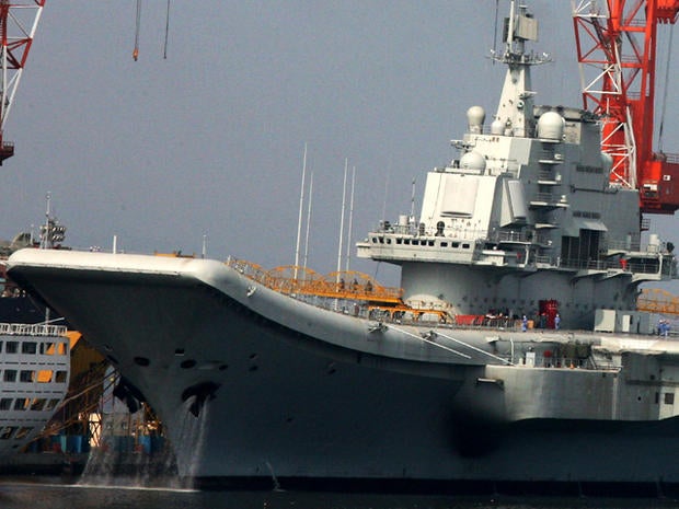 China's first aircraft carrier, the former Soviet carrier Varyag, is seen Aug. 4, 2011, at the Port of Dalian in northeast China's Liaoning Province. The aircraft carrier has begun its inaugural sea trial, the defense ministry said Aug. 10, 2011, a move likely to stoke concerns about the nation's rapid military expansion.