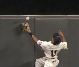 Ben Revere climbs the wall