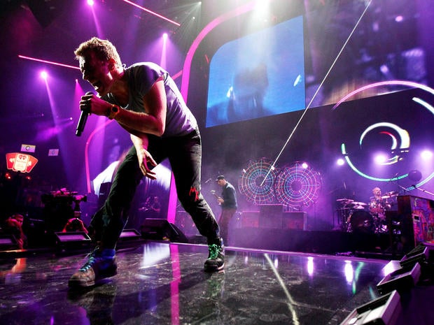 Musician Chris Martin of Coldplay performs onstage at the iHeartRadio Music Festival held at the MGM Grand Garden Arena on Sept. 23, 2011, in Las Vegas, Nevada.