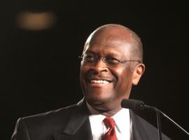FILE - In this Friday, Sept. 23, 2011 file photo, Republican presidential candidate Herman Cain arrives onstage to address the Conservative Political Action Conference (CPAC) at the Orange County Convention Center in Orlando, Fla. Herman Cain thinks Rick Perry is a good governor, Newt Gingrich is brilliant and Michele Bachmann is a very nice lady. What about Mitt Romney? Nice hair.