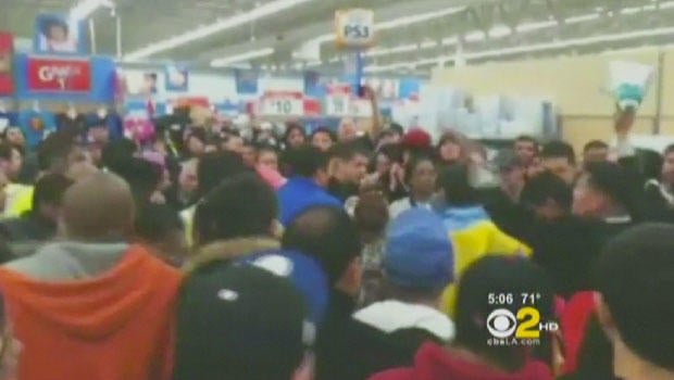 Walmart Black Friday shopper suspected in pepper spray melee surrenders, says report
