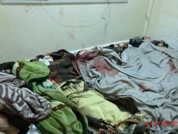 Alleged victims of a government massacre in Homs, Syria