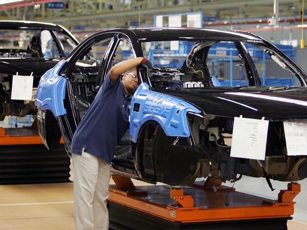MONTGOMERY, UNITED STATES: Hyundai employees work on a car on the assembly line 20 May 2005 during the grand opening of their plant in Montgomery, AL. This is the South Korean car manufacturers first production plant in the US, capable of producing 300,000 cars a year. AFP PHOTO/ROBERT SULLIVAN (Photo credit should read ROBERT SULLIVAN/AFP/Getty Images)