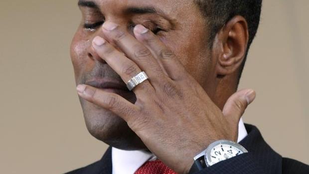 Former Cincinnati Reds star Barry Larkin wipes his eye as he gives his acceptance speech during his induction into the National Baseball Hall of Fame and ... - barry_larkin_AP68466848928