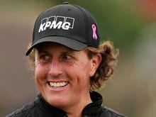 Phil Mickelson of the US prepares to tee off