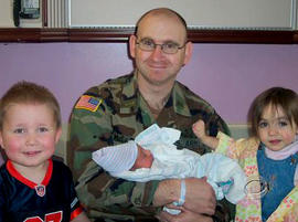 Capt. Michael McCaddon and his children.