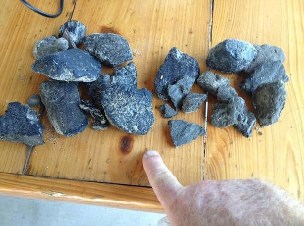 Tar balls that were discovered in the Grand Isle area by a local fisherman. The Louisiana Department of Wildlife and Fisheries has closed off a section of the coast to fishing due to tar balls and a tar mat.