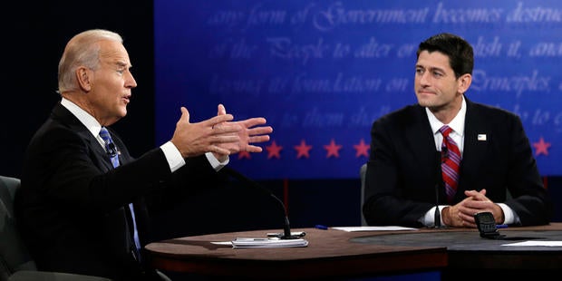 Republican vice presidential nominee Rep. Paul Ryan, of Wisconsin, right, listens as Vice President Joe Biden speaks during the vice presidential debate at Centre College, Thursday, Oct. 11, 2012, in Danville, Ky.