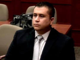 George Zimmerman watches during his hearing at the Seminole County Courthouse in Sanford, Fla., Dec. 11, 2012.