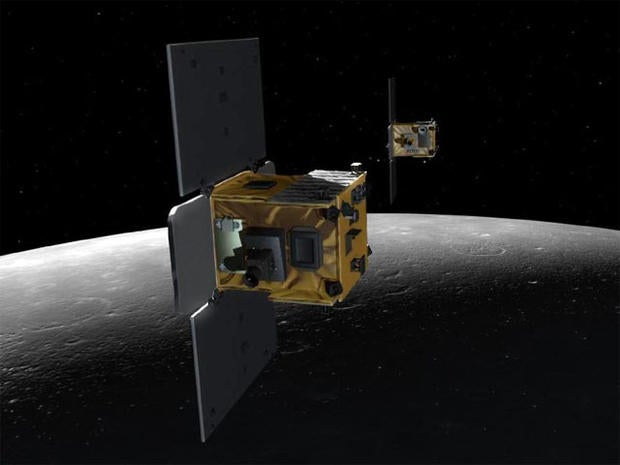An artist's depiction of the twin spacecraft (Ebb and Flow) that comprise NASA's Gravity Recovery And Interior Laboratory (GRAIL) mission.