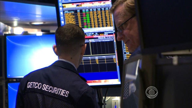 Traders on the floor of the New York Stock Exchange on Wall Street.