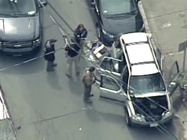 Abandoned vehicle after carjacking by Boston bombing suspect.