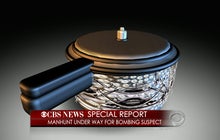 Suspect threw pressure cooker bomb at police during shootout