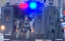 Boston on high alert as one bombing suspect is still at large