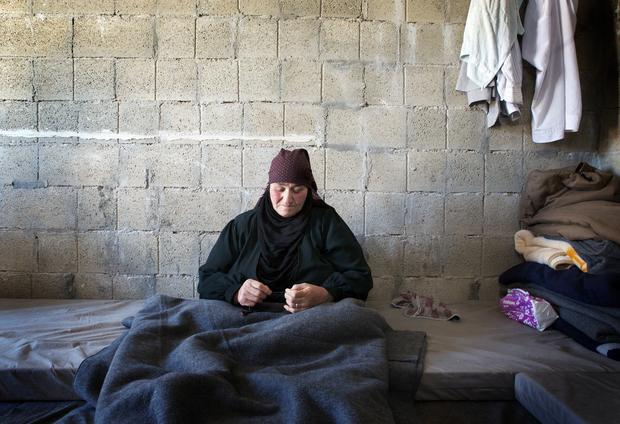 Hamdah, 70, trapped in her hut at the Zaatari camp