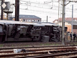 A derailed train carriage is seen at the site of an accident in the railway station of Bretigny-sur-Orge, France, July 12, 2013, near Paris.