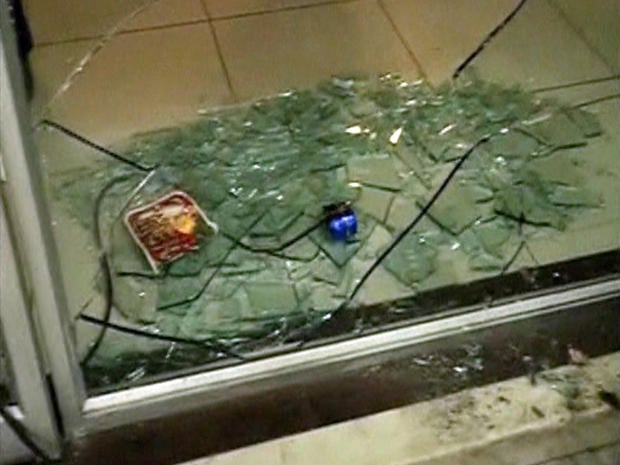mumbai_dominos_broken_window.jpg