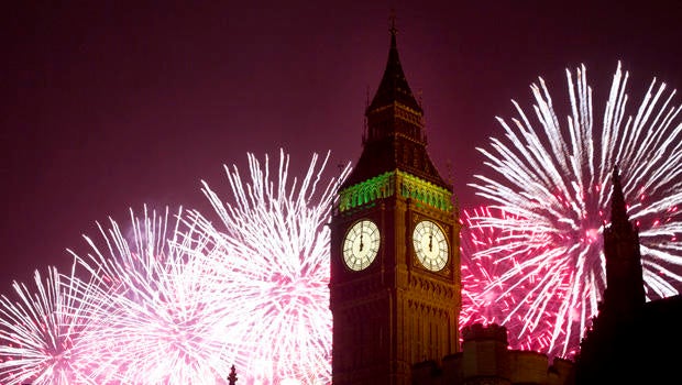 Fireworks explode over the Houses of Parliament, including Queen Elizabeth II tower which holds the bell known as Big Ben as London celebrates the arrival of New Year's Day