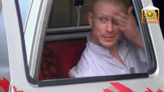 U.S. Army Sergeant Bowe Bergdahl waits in a pick-up truck before he is freed