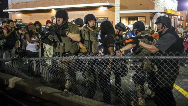 A year after Ferguson, blacks say police treat them unfairly - CBS News