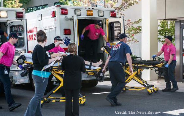 A patient is wheeled into the emergency room at Mercy Medical Center following a shooting at Umpqua Community College in Roseburg, Oregon, Oct. 1, 2015.