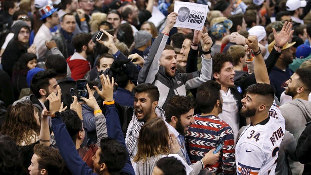 Demonstrators cheer after Republican presidential candidate Donald Trump canceled his rally at the University of Illinois at Chicago March 11, 2016.