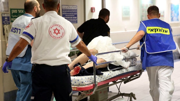 Injured person is taken into emergency room following shooting attack in center of Tel Aviv on June 8, 2016