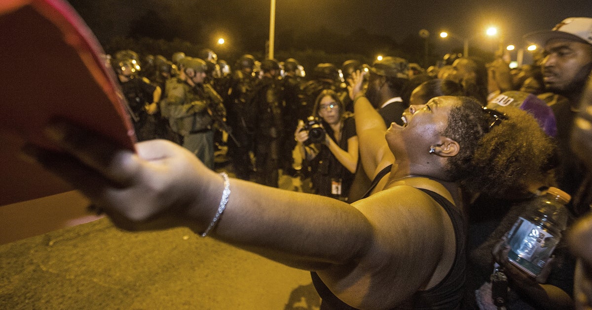 Tense protests against police violence continue in Baton Rouge, St. Paul - CBS News