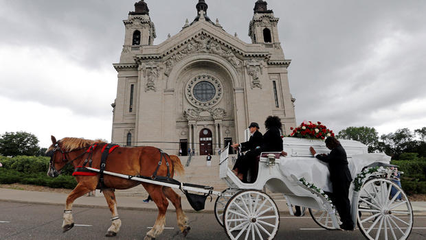 Mourners pay respects to black Minnesota man shot by officer