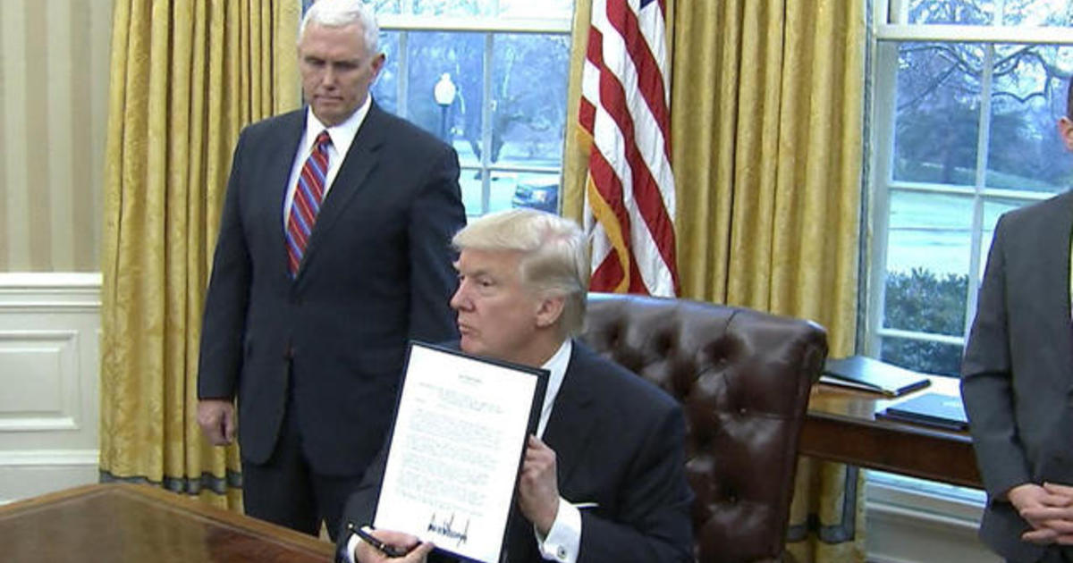 Watch: President Trump signs executive orders, including withdrawal from TPP